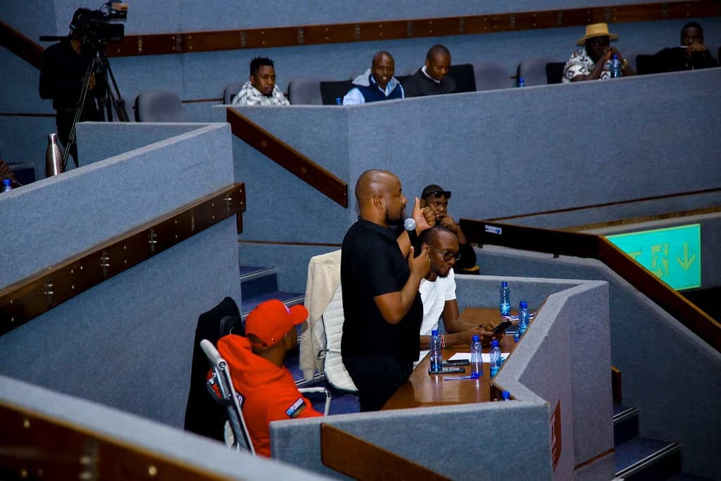 Keith Muoki engaging with conference participants